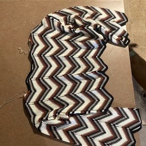 Francesca’s multi color sweater. Never worn. Price tag still on. New condition.